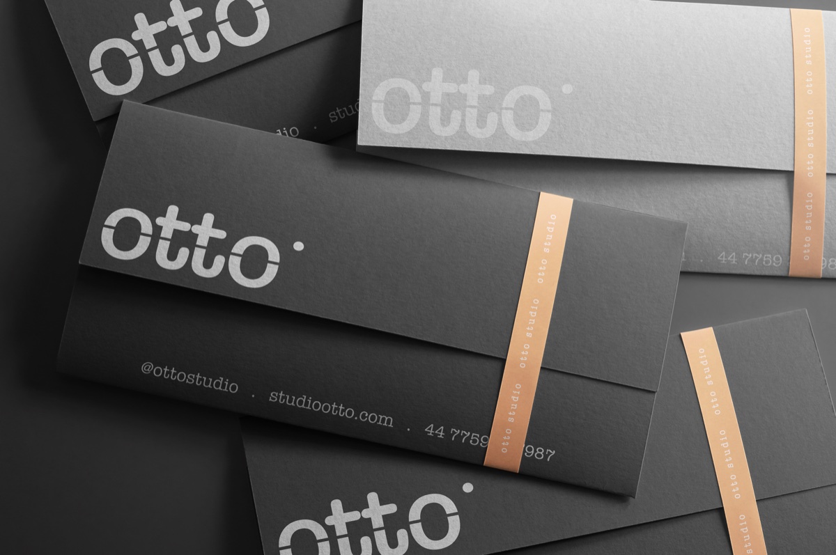 Otto Studio branded envelopes with orange seal